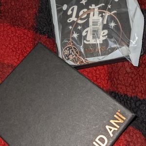 Rose gold Let it Be Alex and Ani bracelet.